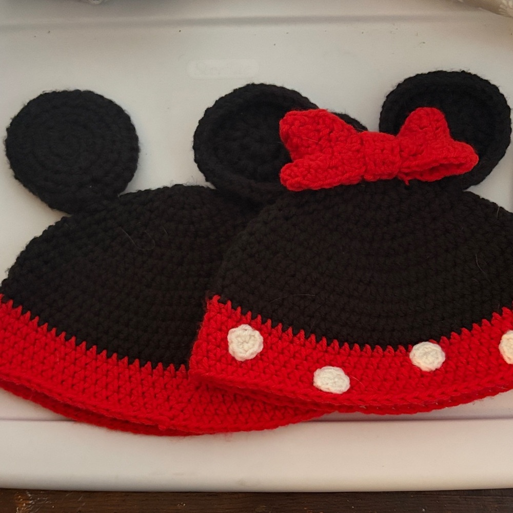 Set of Mickey and Minnie Mouse crocheted red and black hats with ears